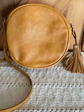 Antik Kraft Vegan Leather Round Crossbody Leather Purse with Tassel Tan